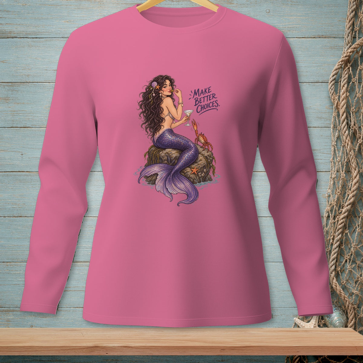 Long-sleeve pink shirt with mermaid and crab graphic with text "Make Better Choices."