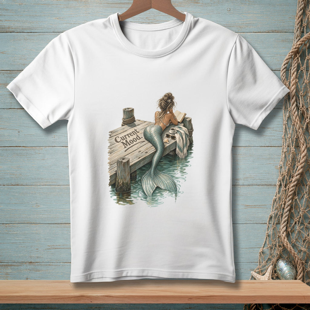 White t-shirt with mermaid on dock reading, "Current Mood" text.