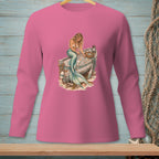 Pink long sleeve shirt with a mermaid sitting on an old boat filled with shells.