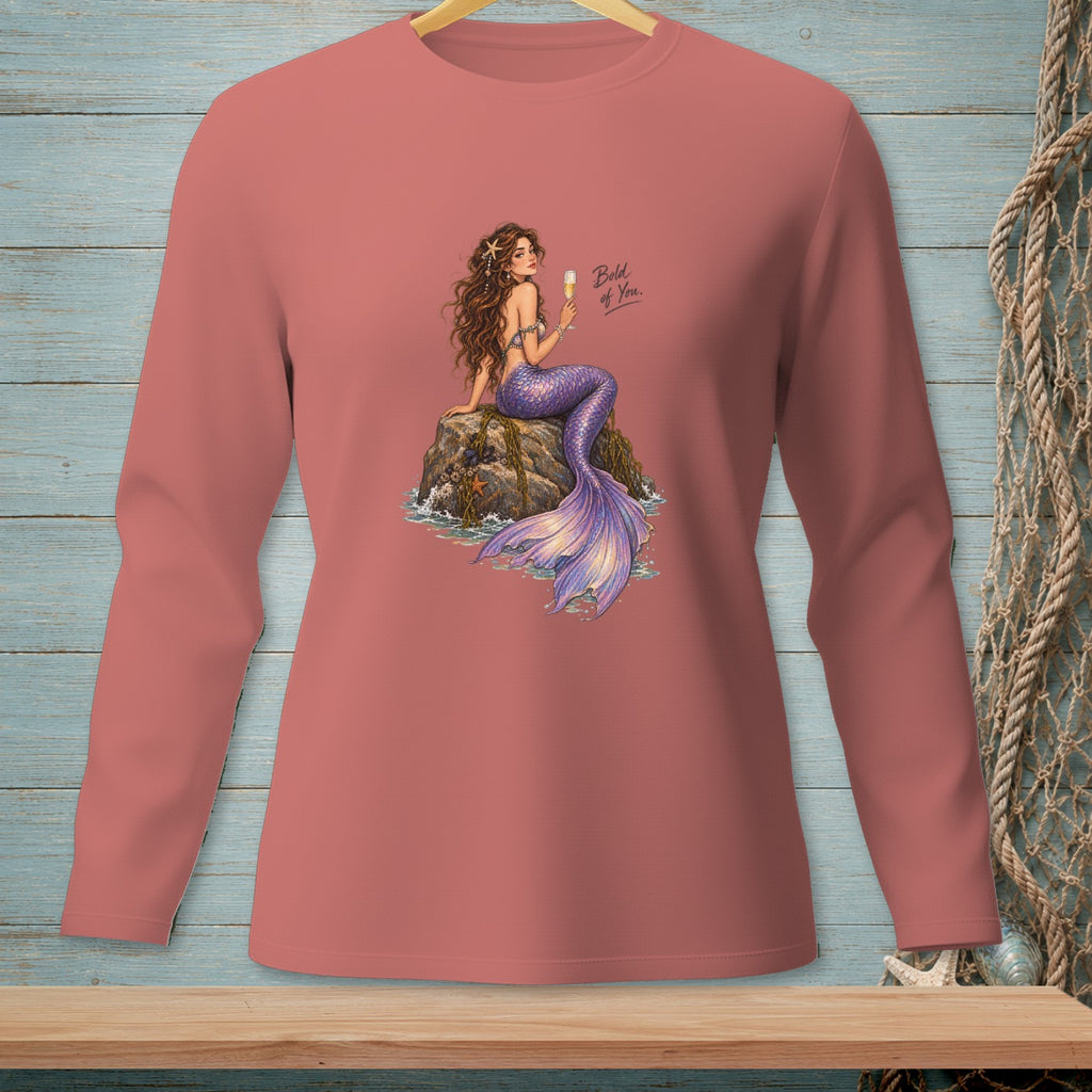 Coral long-sleeve shirt with mermaid art and text "Bold of You."