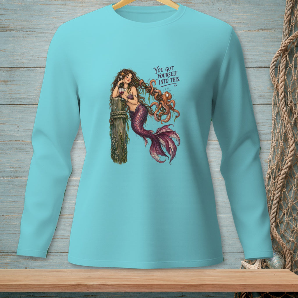 Mermaid tangled with octopus on wood post, "You got yourself into this."