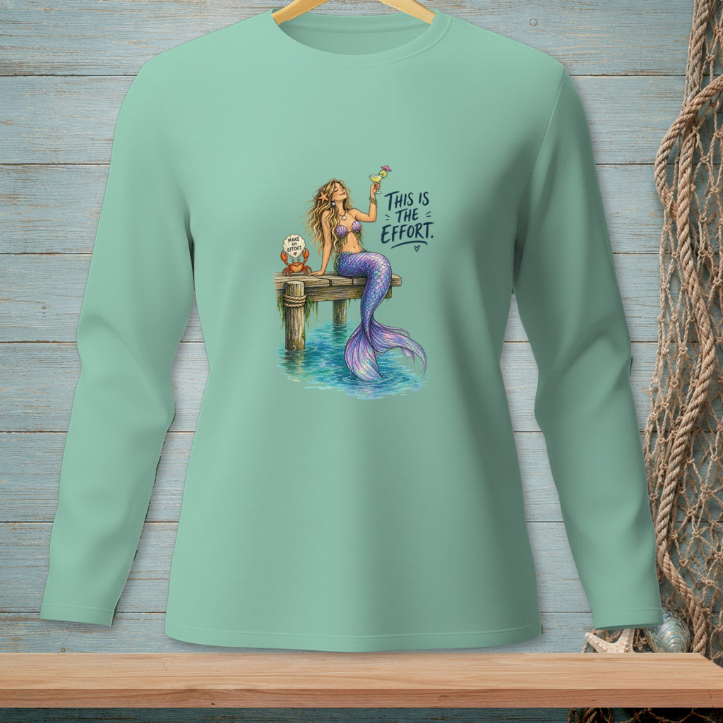 Mermaid with a drink on a dock with crab and text "This is the effort."