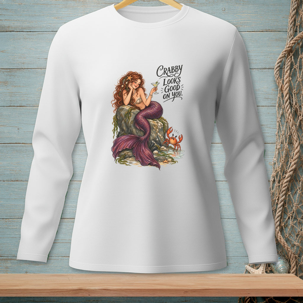 White long-sleeve shirt with mermaid graphic and text "Crabby Looks Good on You."