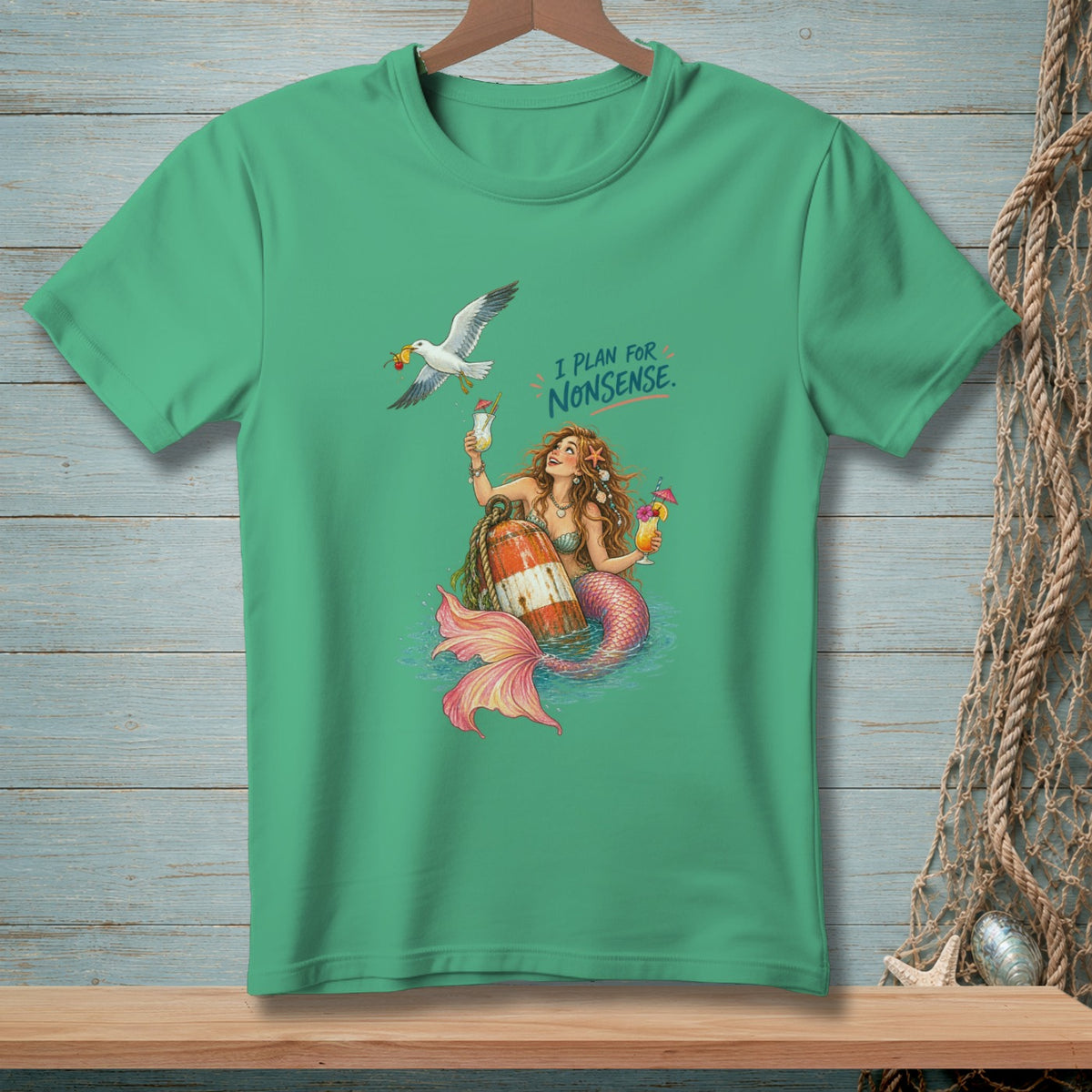 Mermaid with cocktails and a seagull, with text "I PLAN FOR NONSENSE."
