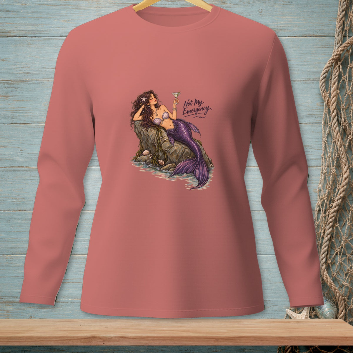 Mermaid with purple tail holding a martini, text "Not My Emergency."
