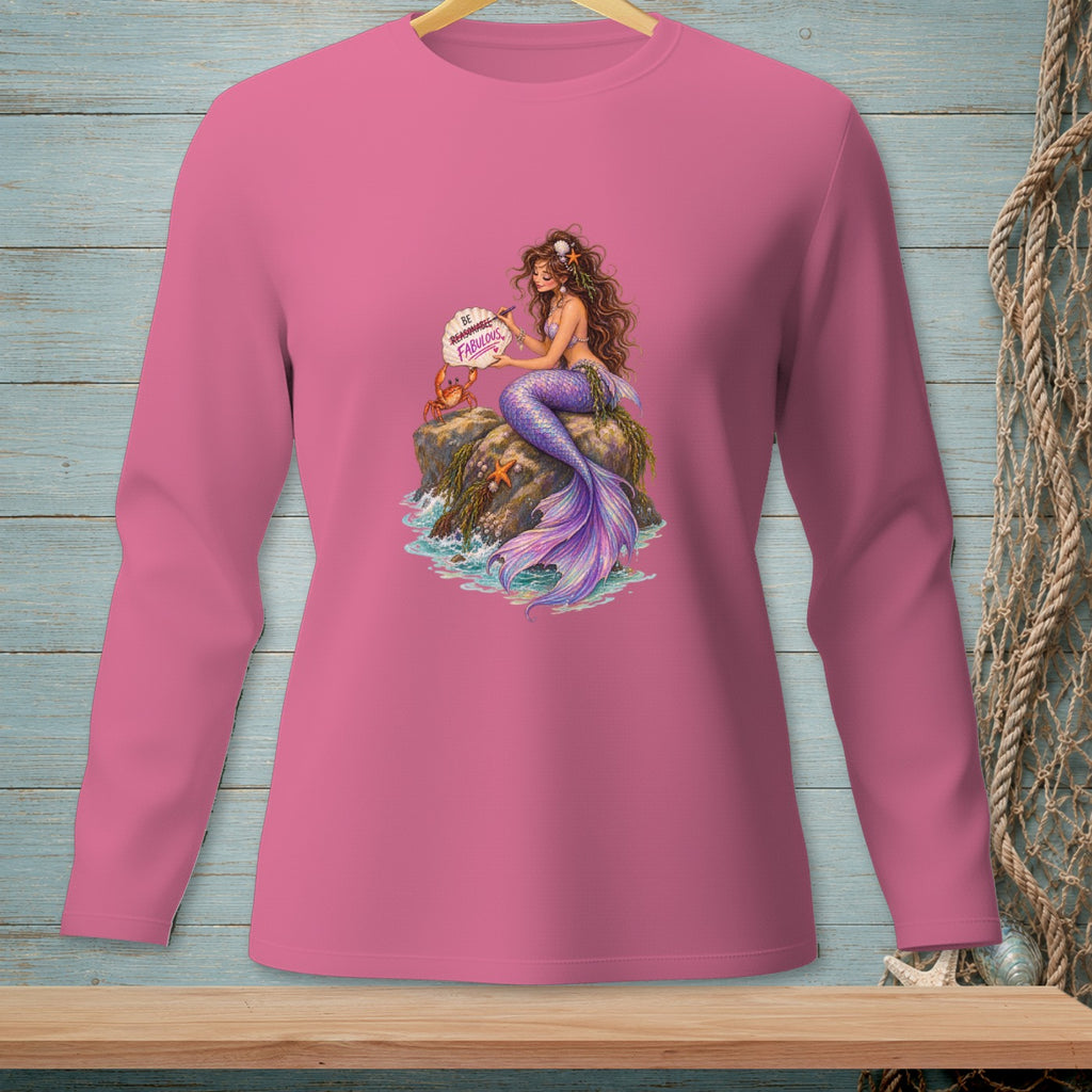 Pink long-sleeve shirt with mermaid graphic holding "Be Fabulous" sign.