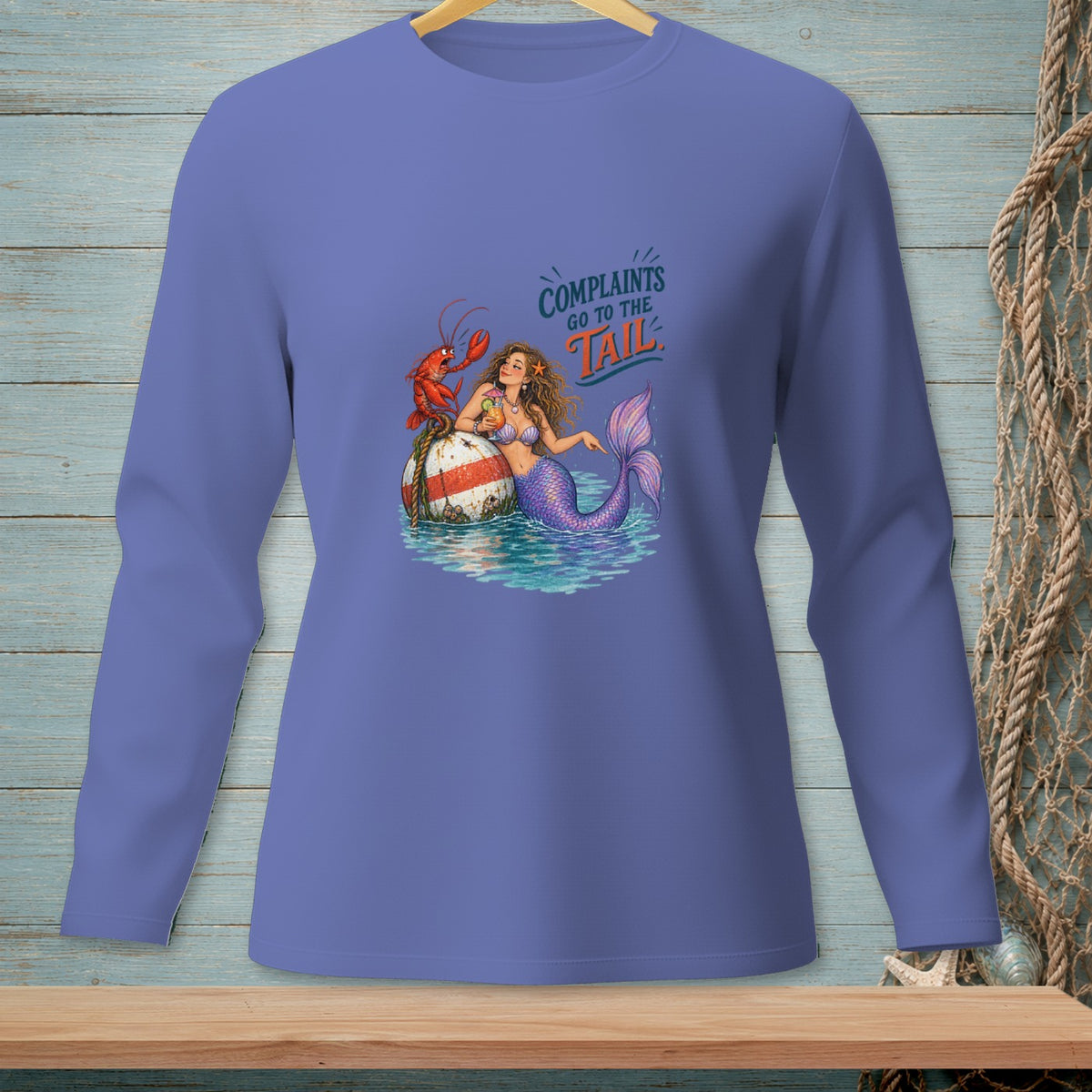 Mermaid and lobster with "Complaints Go To The Tail" text on purple long-sleeve shirt.