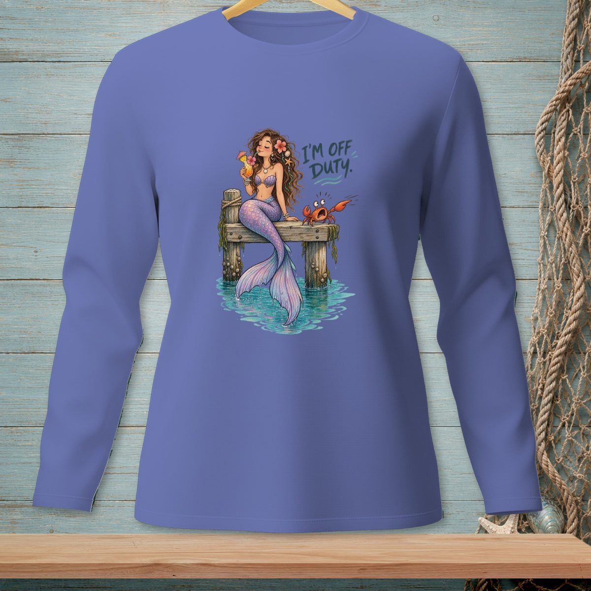 Mermaid with a drink on a dock and a crab, with text "I'm off Duty."