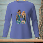 Two mermaids sitting on a dock, one pouring wine for another.