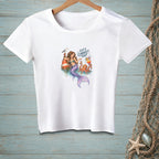 White t-shirt with a graphic of a mermaid, octopus, and lighthouse with text "Let's Correct That."