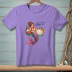 Mermaid with pufferfish and buoy, "That's a lot of drama per inch" text.