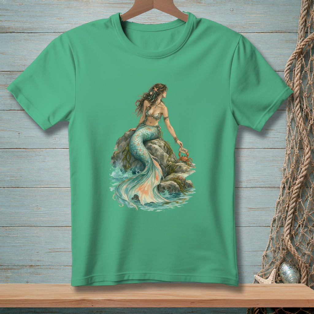 Mermaid sitting on a rock holding a crab with "Smile" sign.