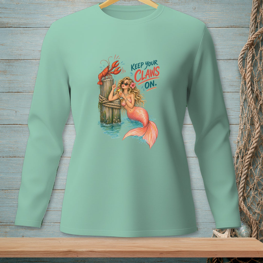 Mermaid with a lobster and cocktail on a dock, "Keep your claws on."
