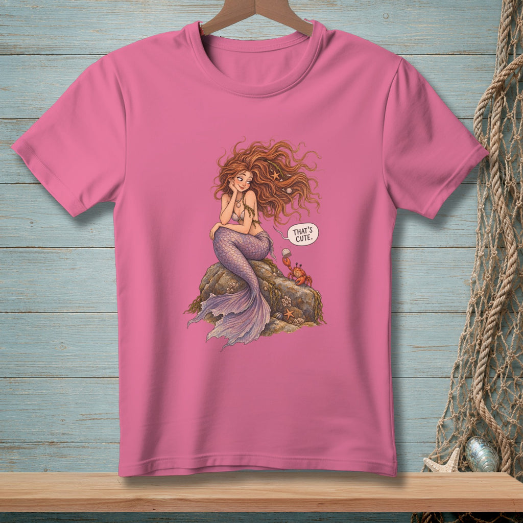 Pink t-shirt with illustration of a mermaid and a crab saying "That's Cute."