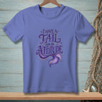 Purple t-shirt with "I have a tail and an attitude" mermaid graphic.