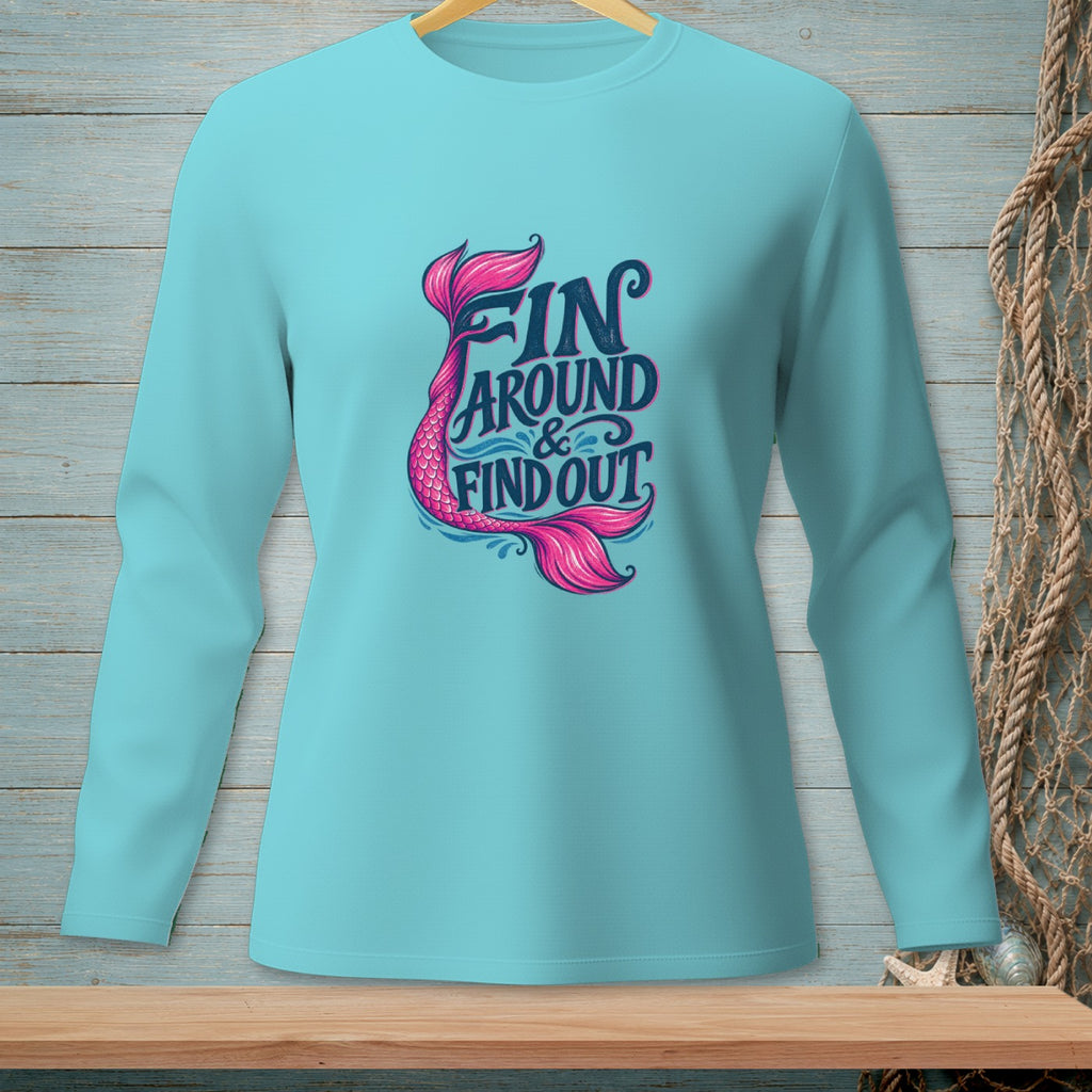 Turquoise long-sleeve shirt with mermaid tail graphic and "Fin Around & Find Out" text.