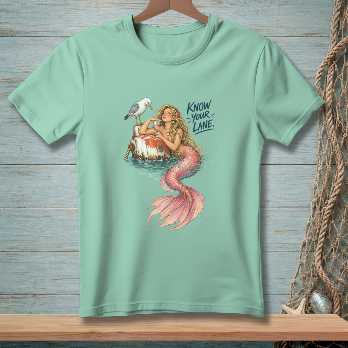 Mermaid with seagull and wine glass on a buoy with "Know Your Lane" text.