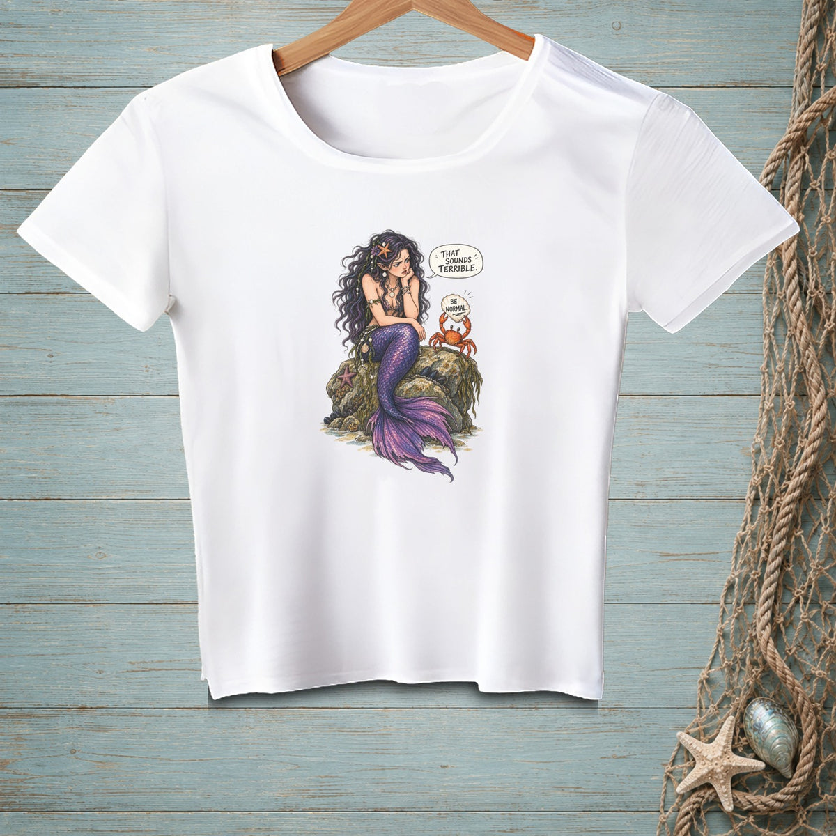 White t-shirt with a mermaid and crab discussing "That sounds terrible. Be normal."
