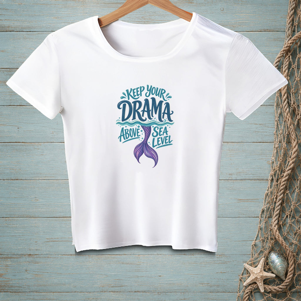 White t-shirt with "Keep Your Drama Above Sea Level" and mermaid tail graphic.