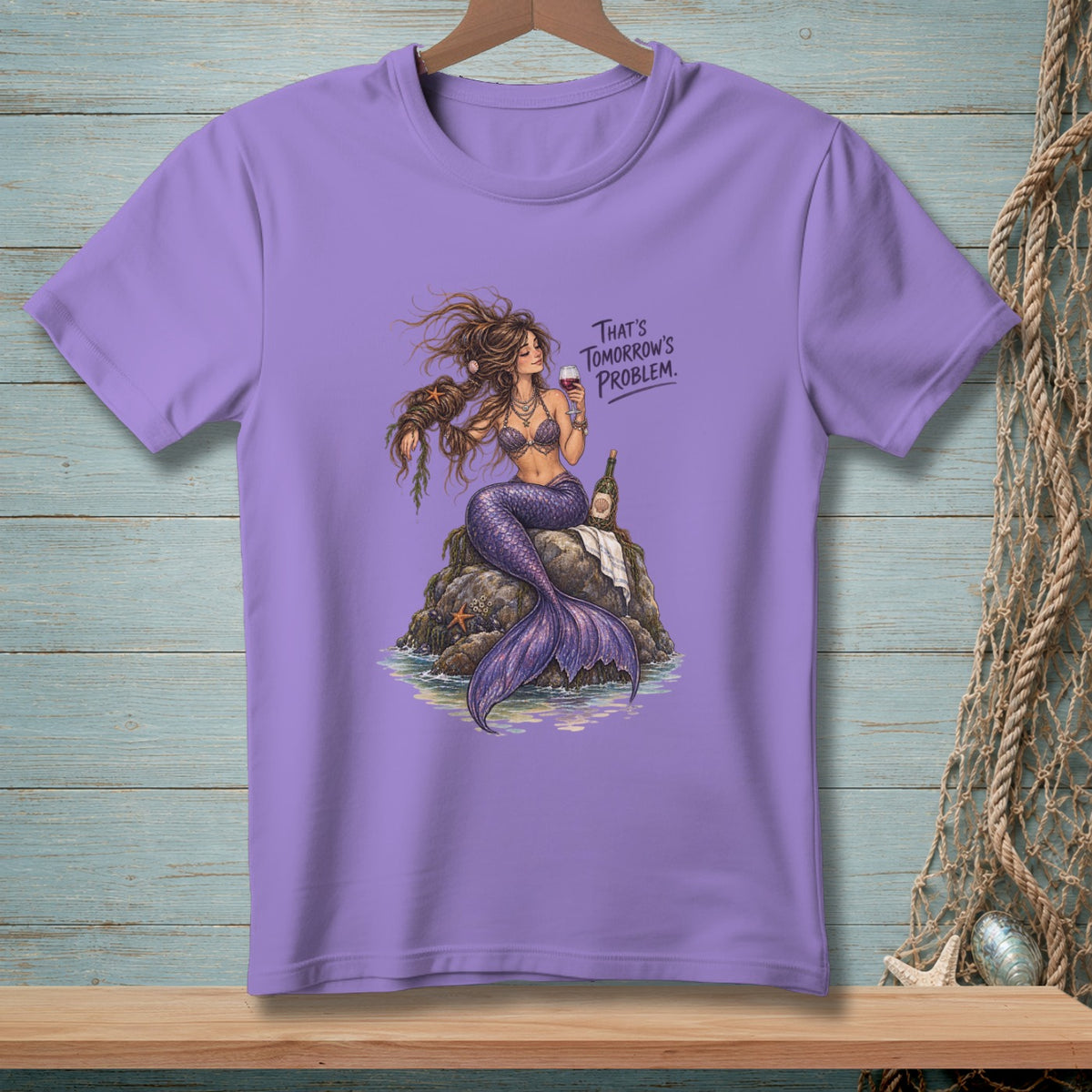 Purple t-shirt with a mermaid sitting on a rock, holding wine, and the text "That's tomorrow's problem."