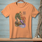 Orange t-shirt with mermaid, octopus, and text "NOT MY FIRST JANGLE".