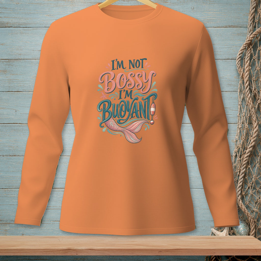 Orange long-sleeve shirt with "I'm Not Bossy I'm Buoyant" and mermaid tail graphic.