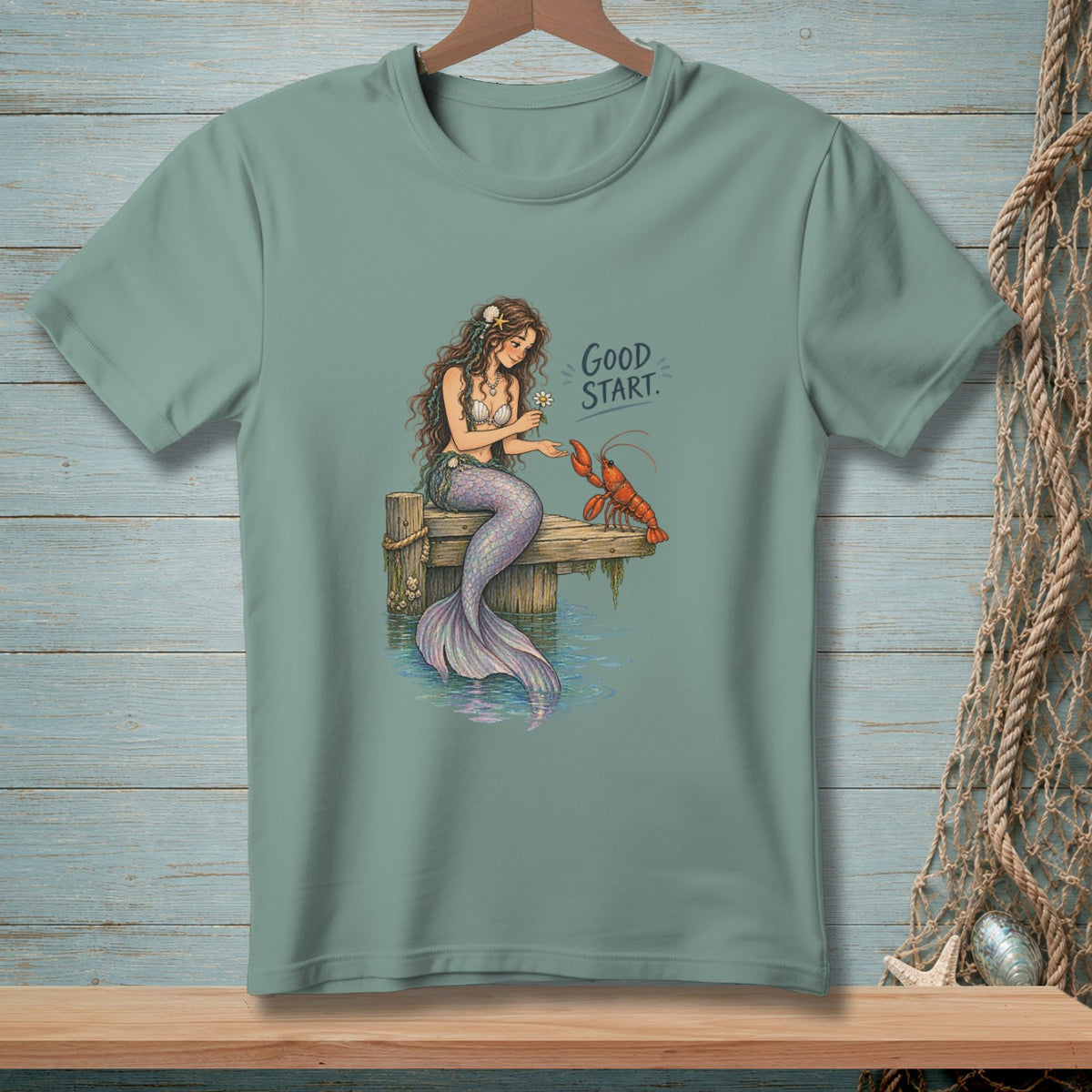 Mermaid with flower meets lobster on pier, "GOOD START." text.