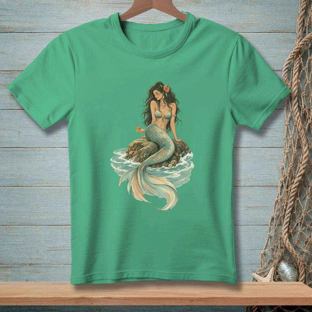 Green t-shirt with a detailed illustration of a mermaid sitting on a rock.