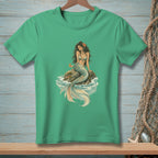 Green t-shirt with a detailed illustration of a mermaid sitting on a rock.