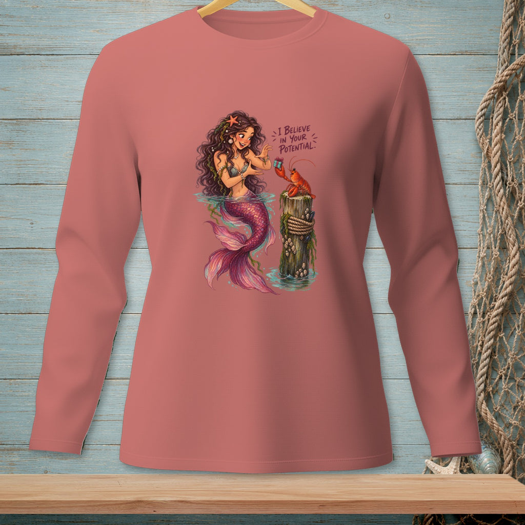 Long-sleeve shirt with mermaid and lobster illustration, reading "I believe in your potential."