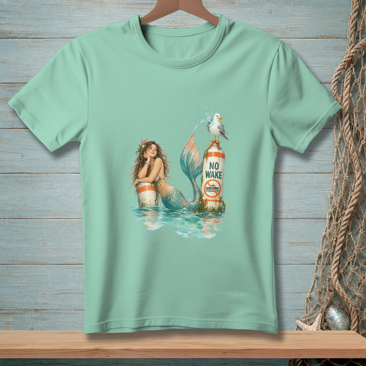 Mermaid with a seagull on a "No Wake" sign in the water.