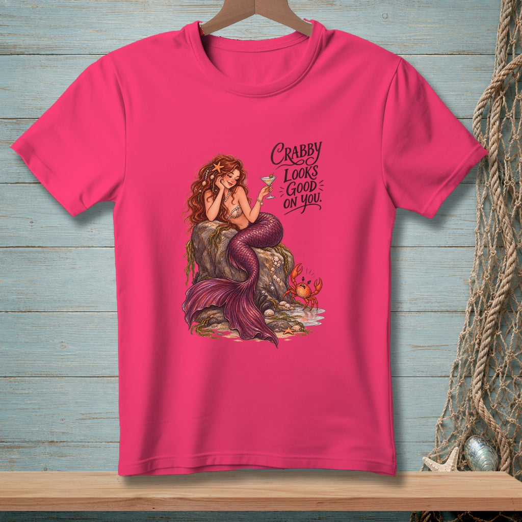 Pink t-shirt with mermaid, crab, and "Crabby Looks Good On You" text.