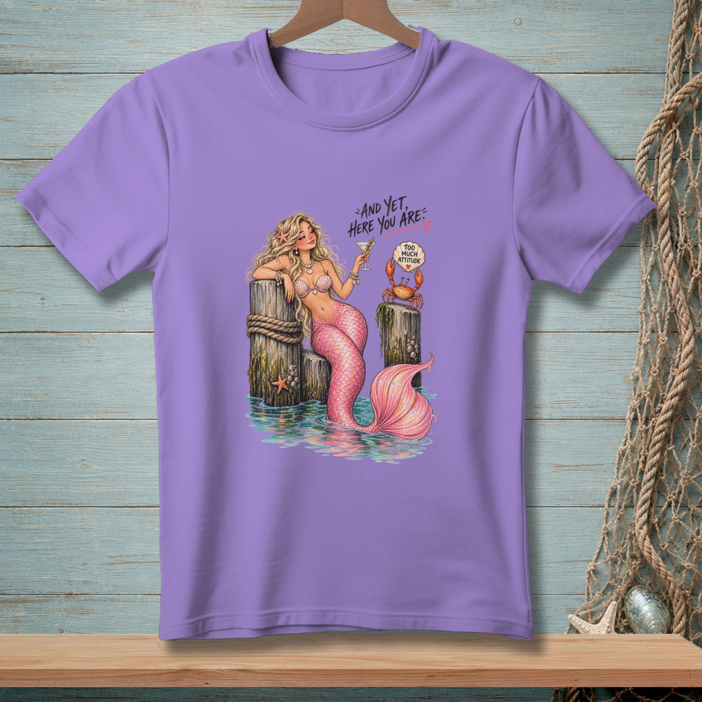 Mermaid with cocktail and crab, text: "And yet, here you are."
