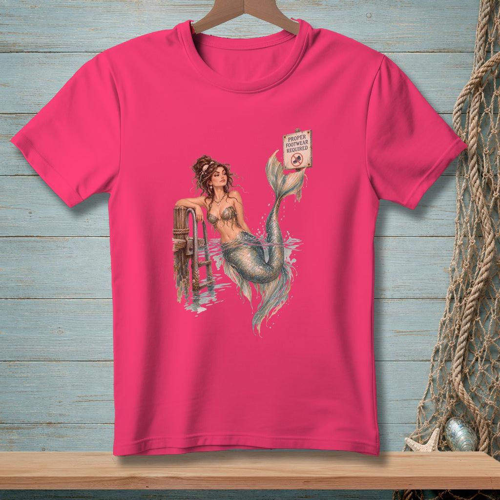 Pink t-shirt with mermaid graphic and "Proper Footwear Required" sign.