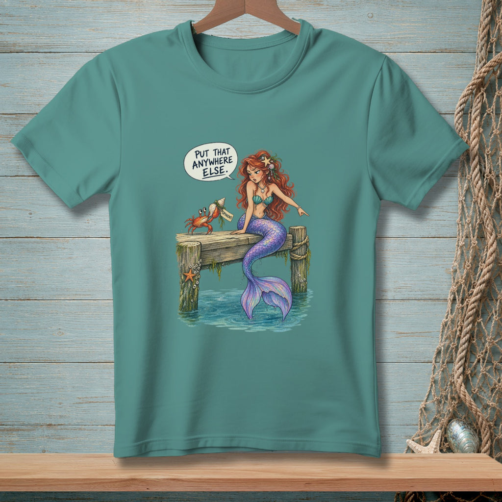 Mermaid and crab on dock, with speech bubble "Put that anywhere else."