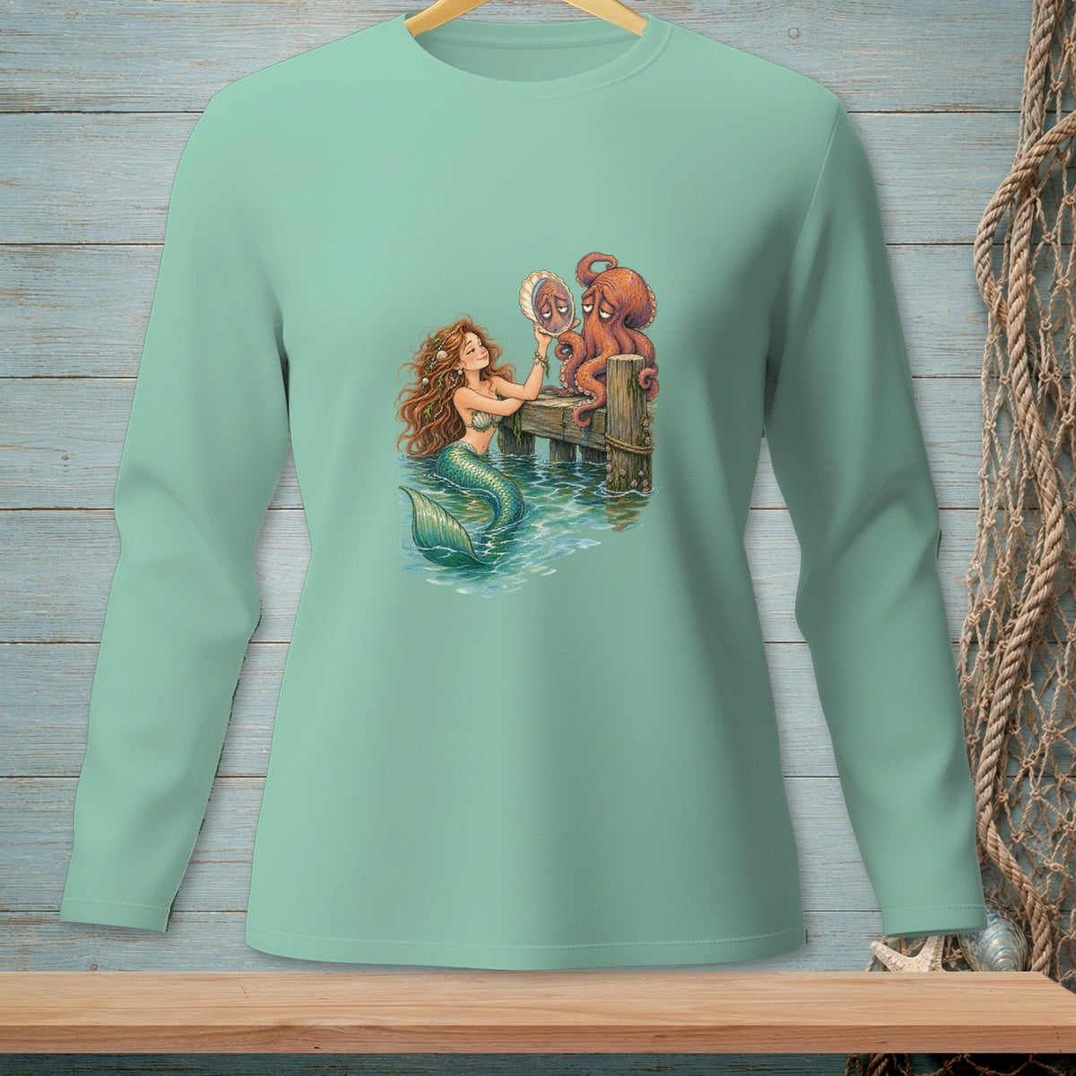 Mermaid and sad octopus looking into a shell on a pier.