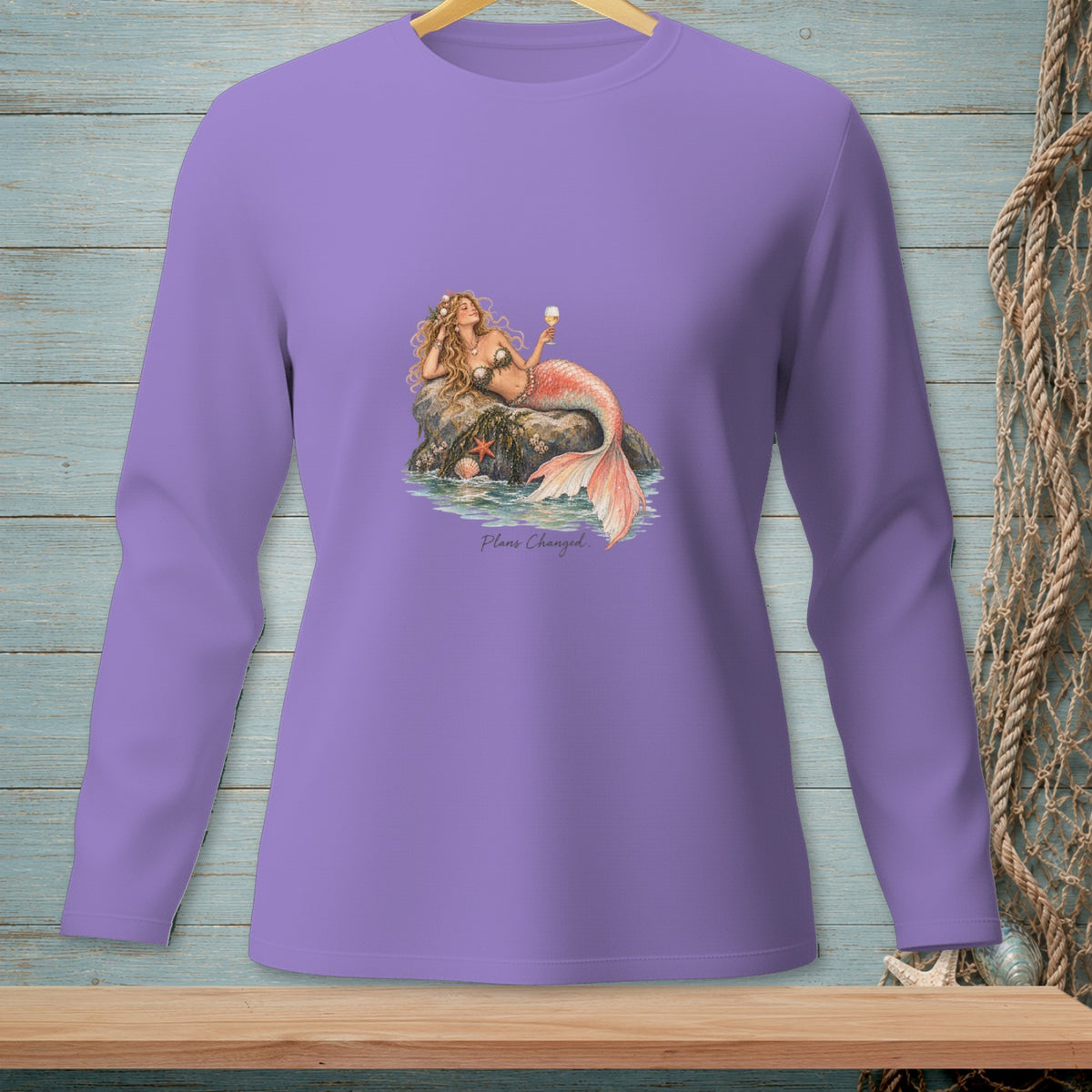Purple long-sleeve shirt with a mermaid graphic and text "Plans Changed."