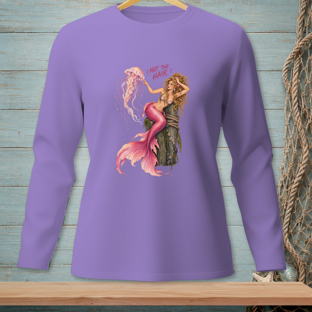 Mermaid with pink tail touching a jellyfish, text reads "NOT THE HAIR."