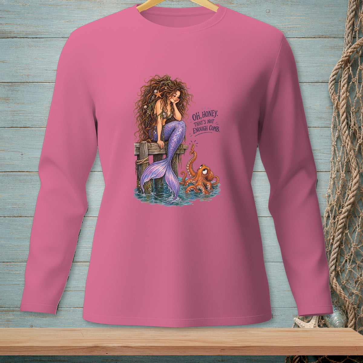 Mermaid with octopus on dock, with text "OH, HONEY. THAT'S NOT ENOUGH COMB."