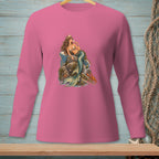 Long sleeve pink shirt with a detailed mermaid graphic on rocks with champagne.