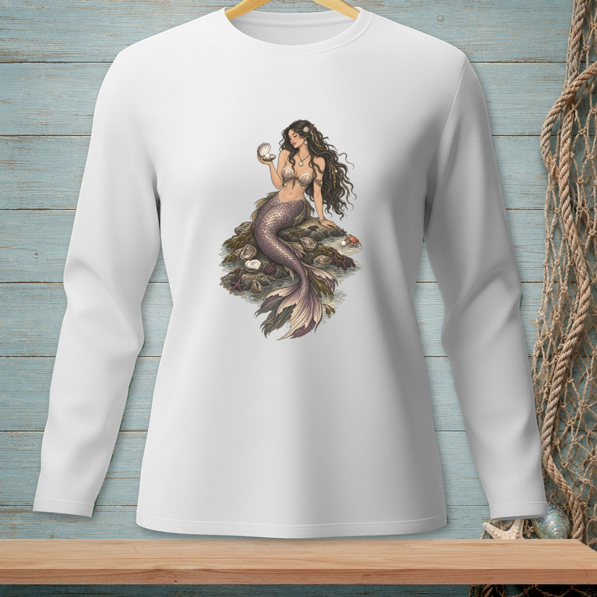Illustration of a mermaid holding a shell, sitting on rocks with oysters and a crab.