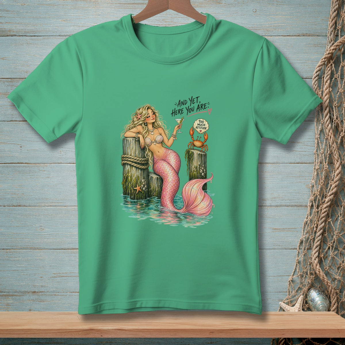 Mermaid with pink tail drinks cocktail with crab saying "Too Much Attitude".