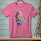 Mermaid under an umbrella with a dolphin splashing in water.