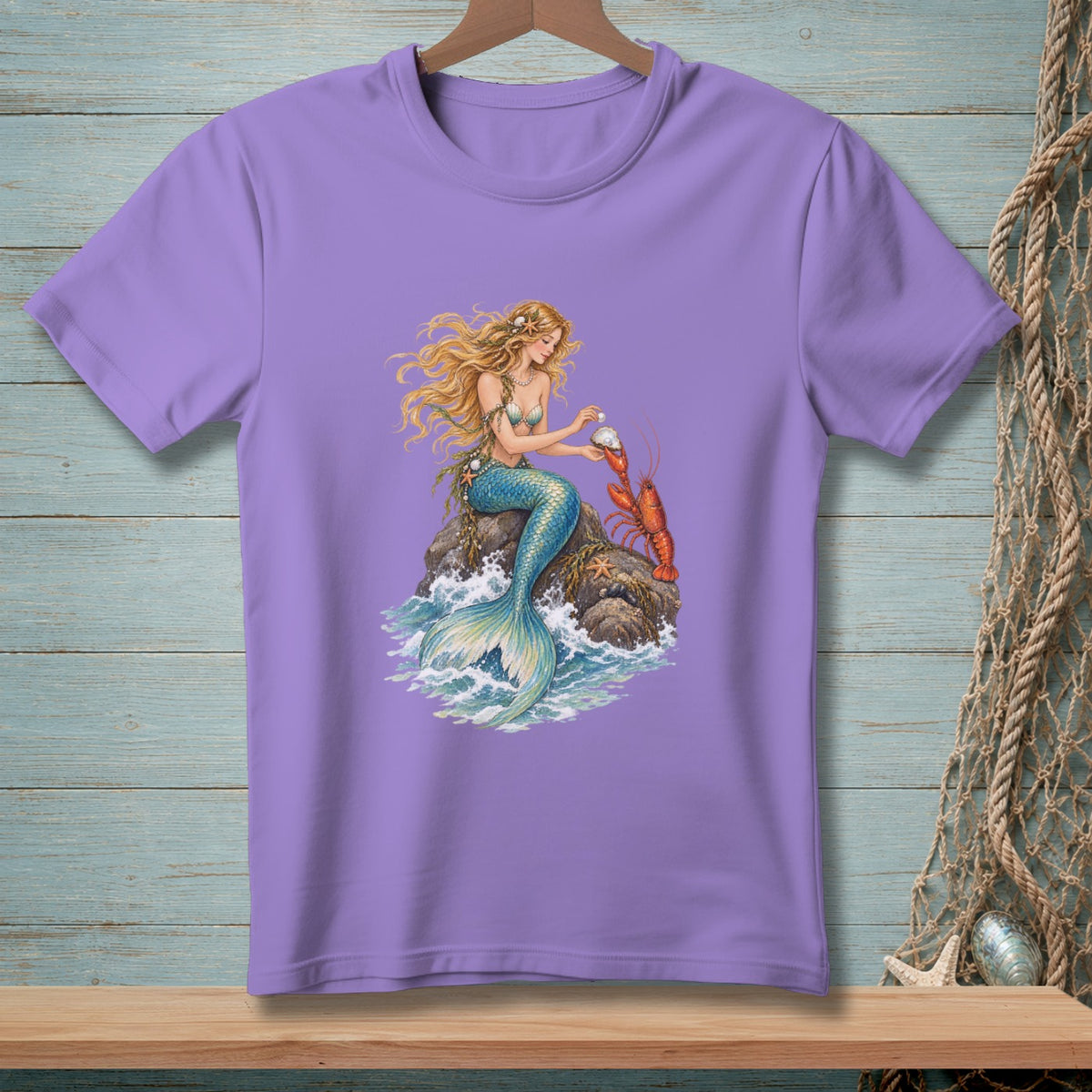 Mermaid with blonde hair sits on a rock with a lobster and pearl.