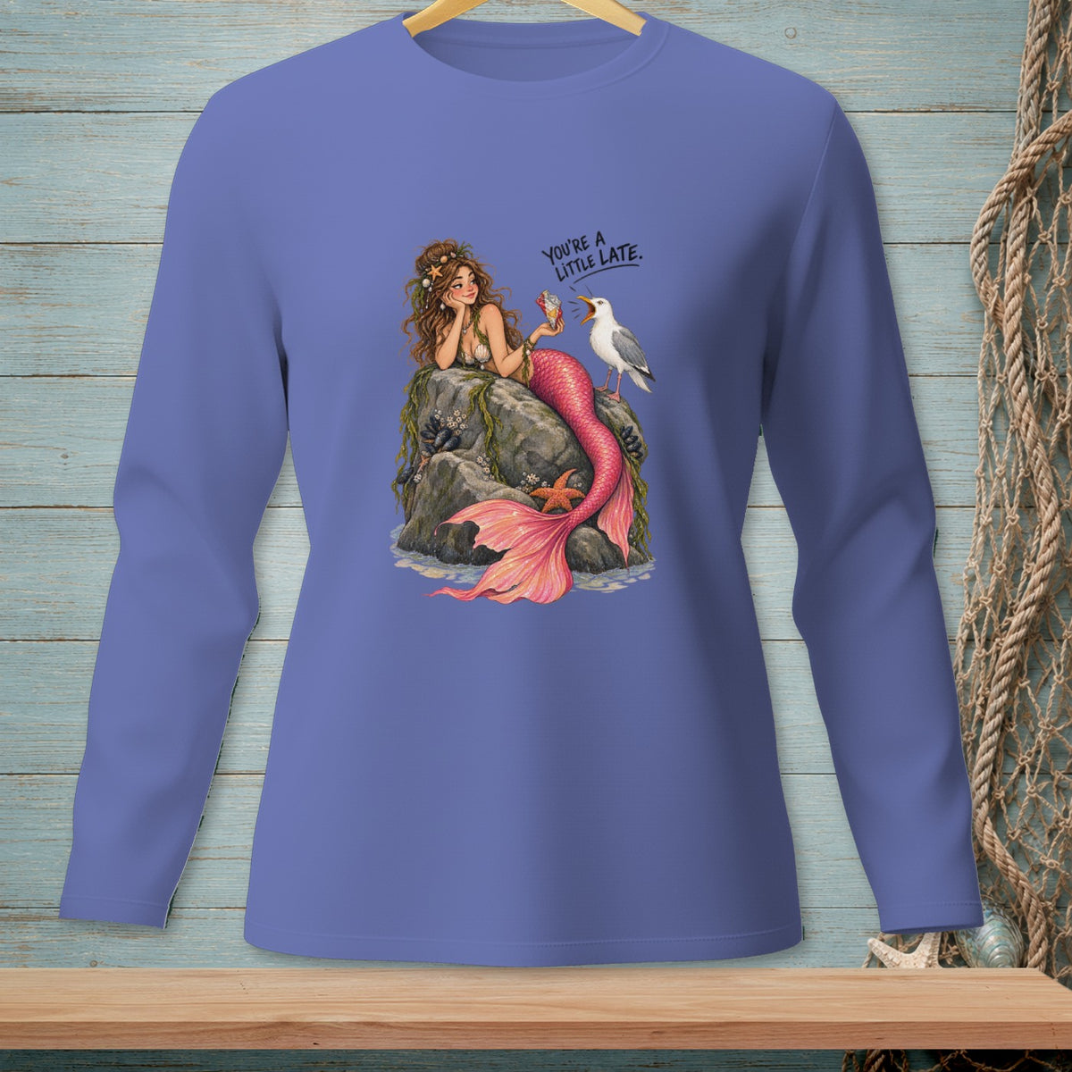 Mermaid sitting on a rock shares ice cream with a seagull; text says "You're a little late."