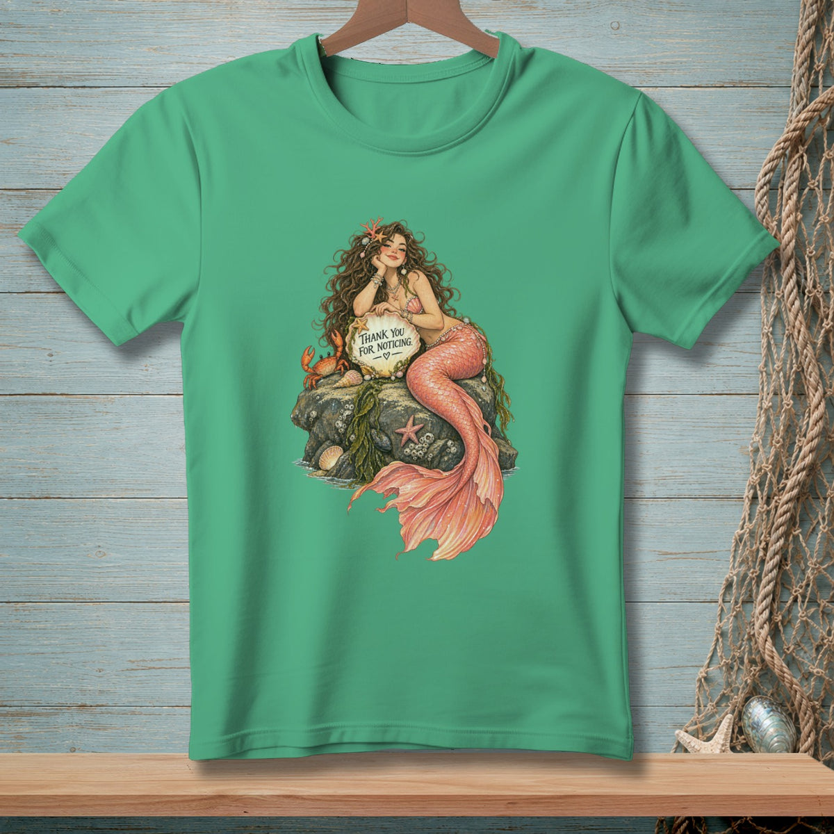 Mermaid sitting on a rock with text that says "THANK YOU FOR NOTICING."