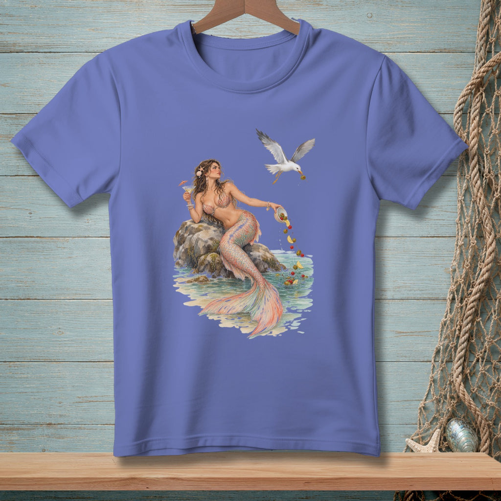Mermaid with cocktail and seagull on a rock near the water.