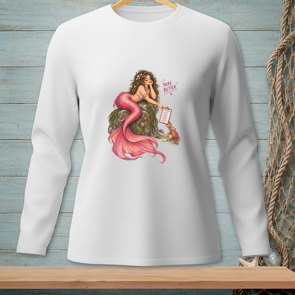 Mermaid with pink tail sits on rock holding checklist, crab beside her, text "THERE. BETTER."
