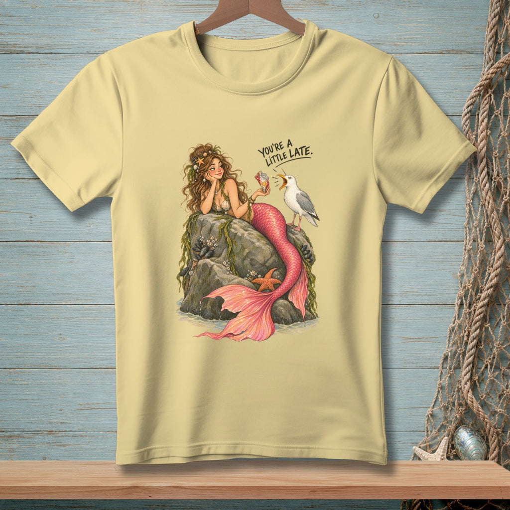 Mermaid with pink tail on rock with seagull and text "You're a little late."