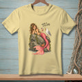 Mermaid with pink tail on rock with seagull and text "You're a little late."